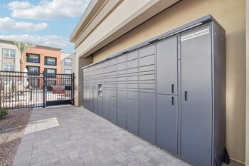 the garage of a building with closed doors at The Maddox Luxury Apartment Homes, Buckeye, 85326